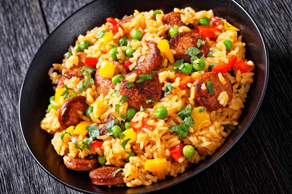 Close Browned Smoked Sausages Rice Bell Pepper Onion Green Peas — Stockfoto