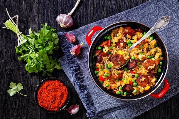 Smoked Sausages Rice Bell Pepper Onion Green Peas Red Pot — Stok fotoğraf