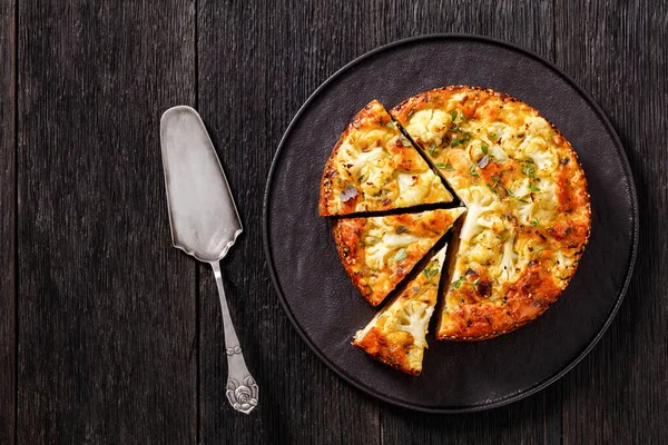 Cauliflower Cake Parmesan Cheese Basil Spices Sliced Black Platter Dark — Stockfoto