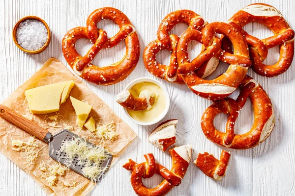 Soft Pretzels Baked Form Knot Sprinkled Salt White Wooden Table — Stockfoto