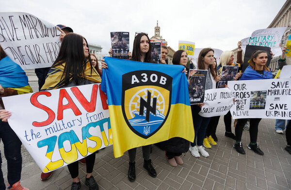 APR 30 2022 People at action in support of defenders (azov, marines) and civilians, who are being killed in Mariupol by russian army, at Maidan Nezalezhosti Kyiv