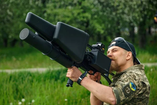 KYIV, UKRAINE Ukrainian militaries testing portable antidrone jammer (counter drone rifle) EDMS, long-range electronic gun for combating multicopter, MAY 14, 2022