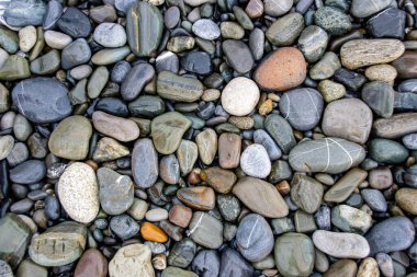 Soyut çakıl taşı arka planı. Karadeniz sahilinde çakıl taşı dokusu