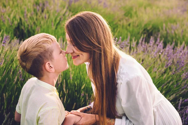 Mom and Son Nose to Nose at Lavender field