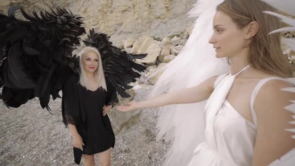 Female models in the image of angels — Stock Video