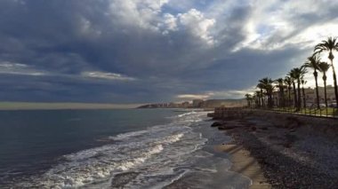Pebble beach and promenade.