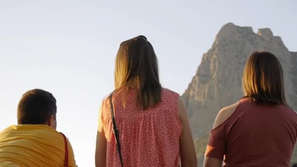 Three Friends Talking Mountain Peak Background Medium Shot — Video Stock