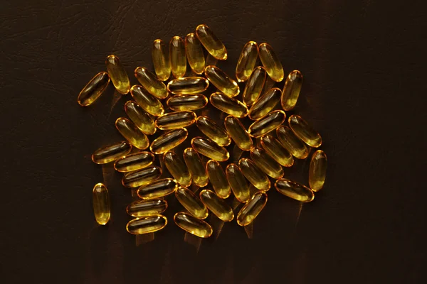 Fish Oil Pills Omega Gel Capsules Black Background — стоковое фото