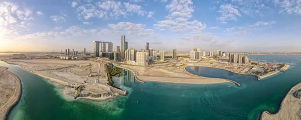 Aerial view on developing part of Al Reem island in Abu Dhabi on a cloudy day Immagini Stock Royalty Free
