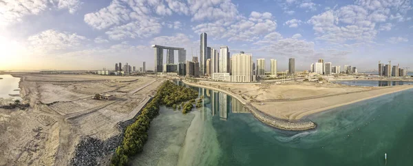 Aerial view on developing part of Al Reem island in Abu Dhabi on a cloudy day — Foto Stock