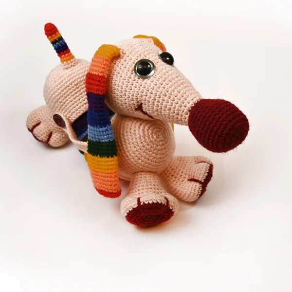 Crocheted handmade amigurumi dolls, soft animal toy. Isolate.