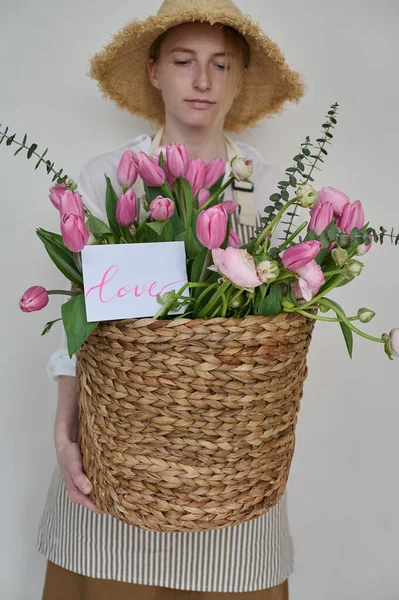 Beautiful Young Florist Wicker Basket Flowers Her Hands Straw Hat — Stock Fotó