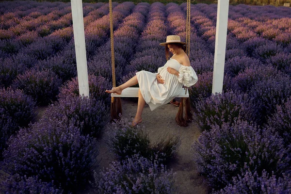 Young Beautiful Pregnant Girl Swing Lavender Field Sunset — Stock fotografie