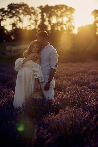Young Beautiful Pregnant Couple Walking Lavender Field Sunset Happy Family — Stockfoto