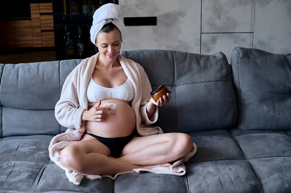 Portrait Beautiful Pregnant Woman Sitting Sofa Doing Morning Self Care — Photo