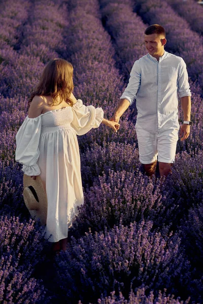 Young Beautiful Pregnant Couple Walking Lavender Field Sunset Happy Family — Zdjęcie stockowe