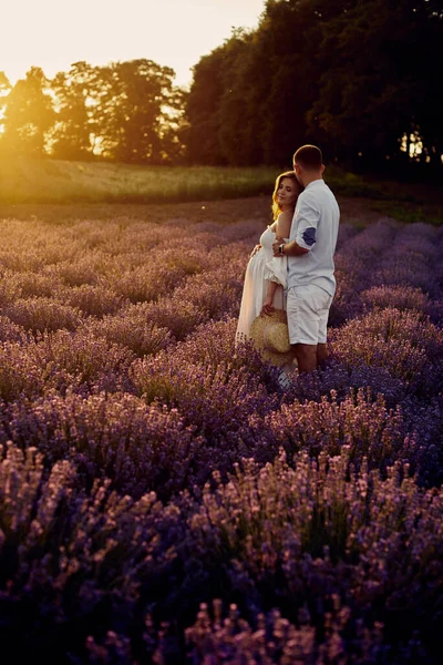 Young Beautiful Pregnant Couple Walking Lavender Field Sunset Happy Family — Stok fotoğraf