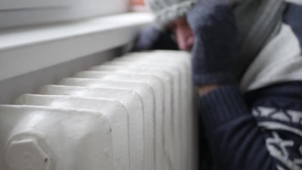 Cold Man Wearing Winter Clothes Tremble Trying Warmth Hot Radiator — Stock Video
