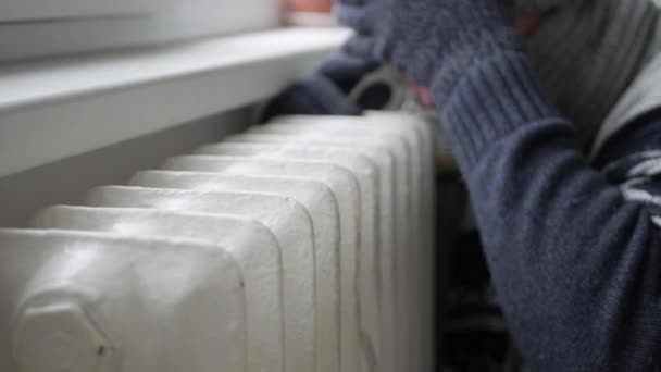 Cold Man Wearing Winter Clothes Tremble Trying Warmth Hot Radiator — Stock Video
