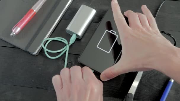 Charging Smartphone Power Bank Black Table Connecting Usb Cable Phone — Vídeo de stock
