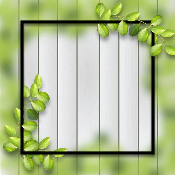 Eine Quadratische Attrappe Mit Grünen Blättern Auf Einem Hölzernen Hintergrund — Stockfoto