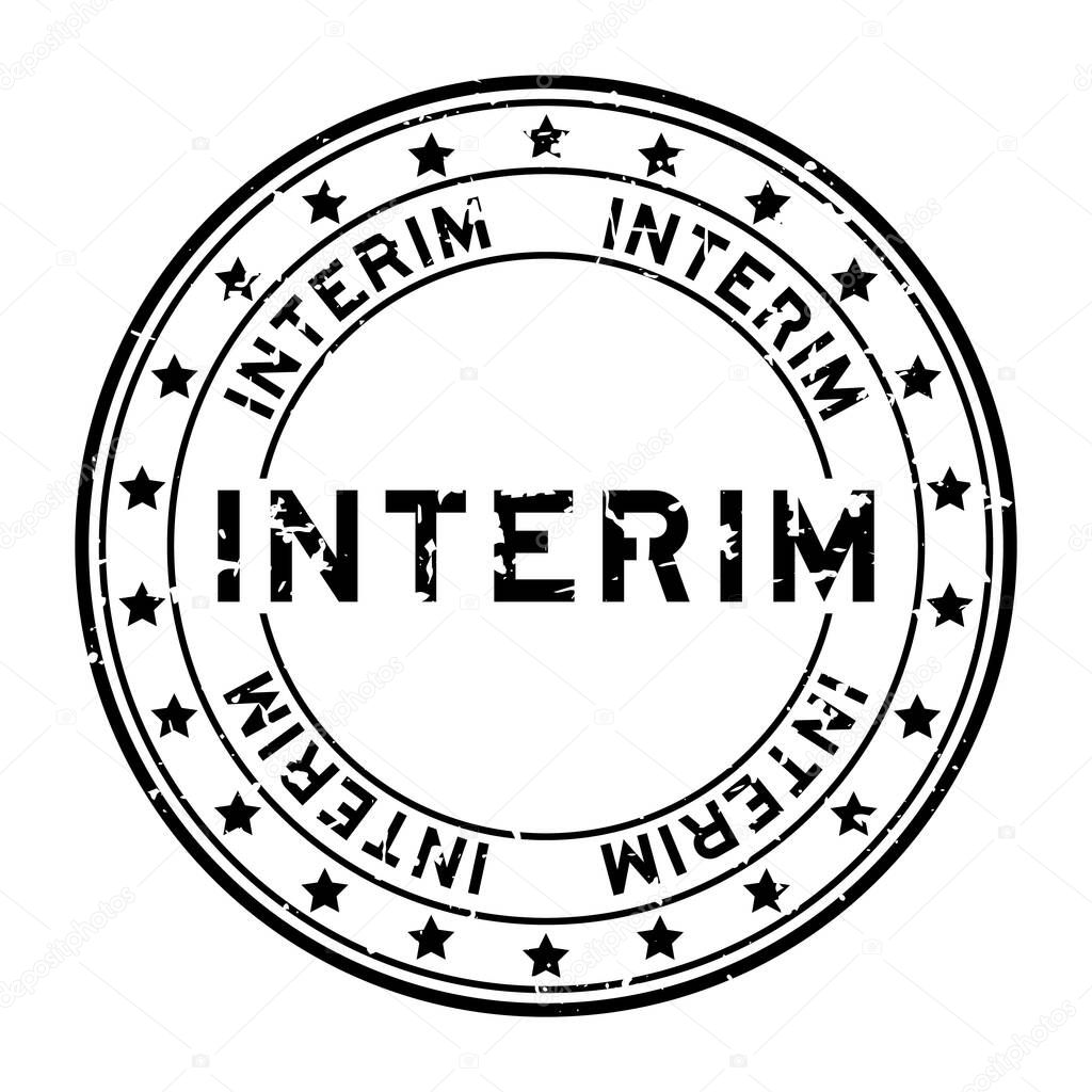 Grunge black interim word with star icon round rubber seal stamp on white background