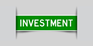 Gri arkaplanda kelime yatırımı olan yeşil renk etiketi eklendi