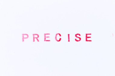 Kırmızı renkli kauçuk mühür beyaz kağıt arka planda kelimesi kelimesine