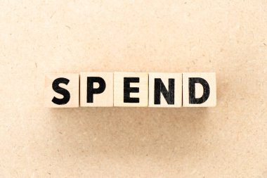 Kelime olarak harf bloğu Tahta arka planda harcamak