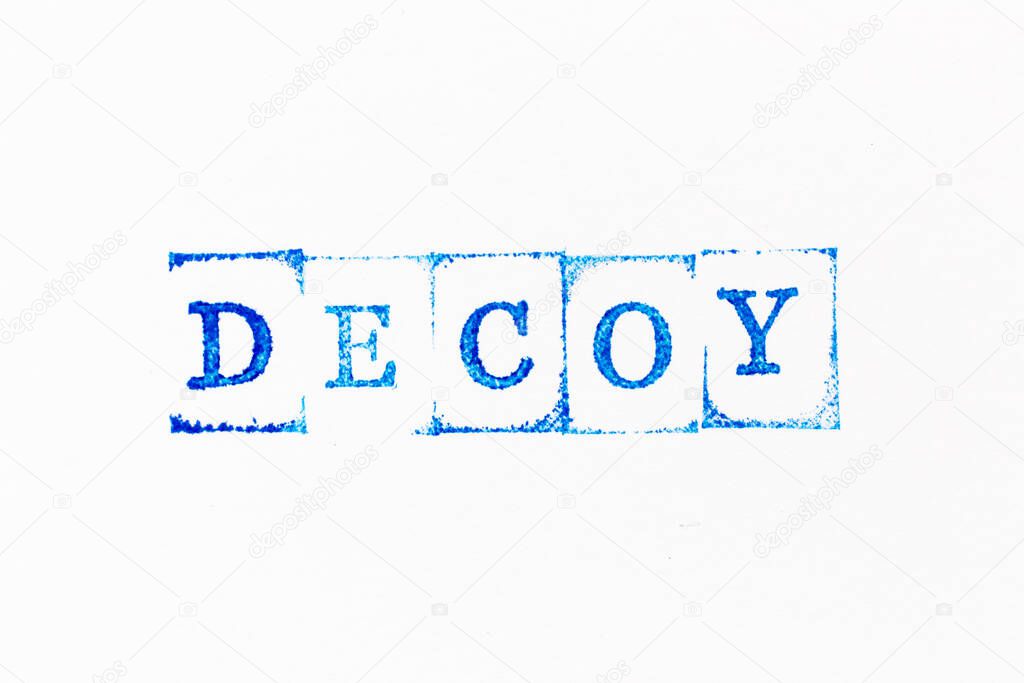 Blue color ink rubber stamp in word decoy on white paper background