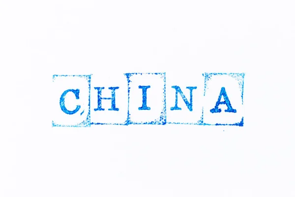 Carimbo Borracha Tinta Cor Azul Palavra China Fundo Papel Branco — Fotografia de Stock