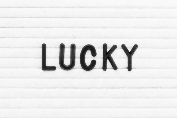 Schwarze Farbe Buchstabe Wort Glück Auf Weißem Filzbrett Hintergrund — Stockfoto