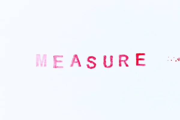 白い紙の背景に単語の測定で赤の色インクゴムスタンプ — ストック写真