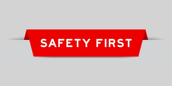 Rote Farbe Eingefügtes Etikett Mit Dem Wort Sicherheit Zuerst Auf — Stockvektor