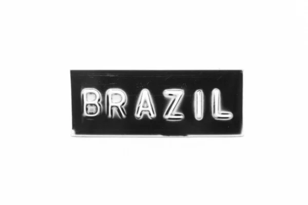Black Color Banner Have Embossed Letter Word Brazil White Paper — Stock Photo, Image