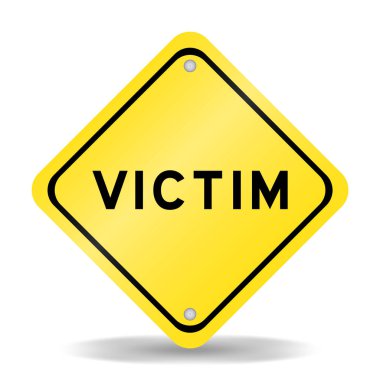 Beyaz arka planda kurban kelimesinin yazılı olduğu sarı taşıma işareti