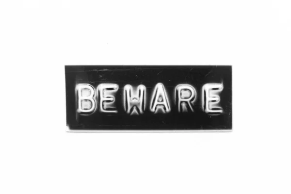 Black Color Banner Have Embossed Letter Word Beware White Paper — Stock Photo, Image