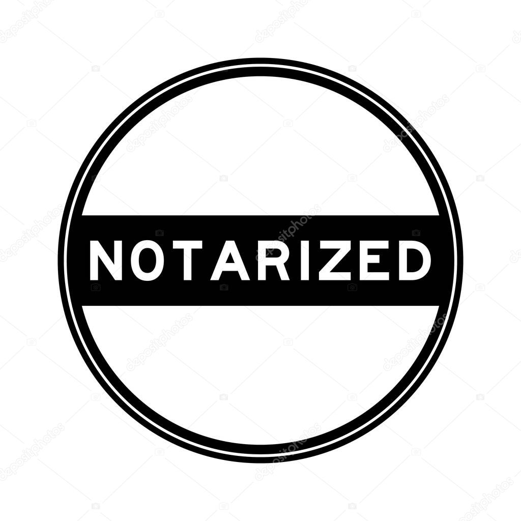 Black color round seal sticker in word notarized on white background
