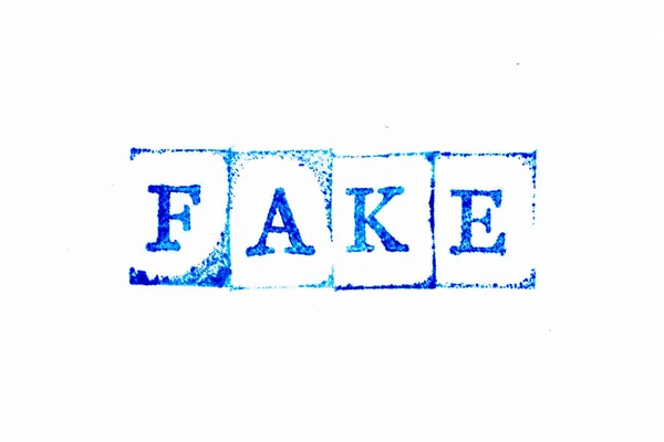 Blaue Farbe Tinte Gummistempel Wort Fake Auf Weißem Papier Hintergrund — Stockfoto