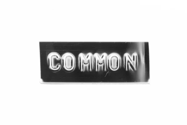 Black Color Banner Have Embossed Letter Word Common White Paper — Stock Photo, Image