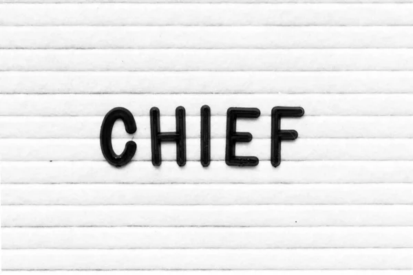 黒文字でワードチーフ上のホワイトフェルトボードの背景 — ストック写真