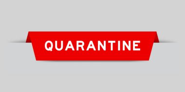 Red color inserted label with word quarantine on gray background