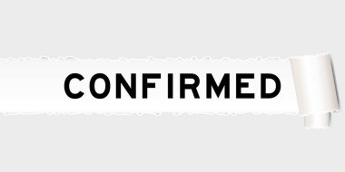 Yırtılmış gri kağıt arka planda sözcüğün yırtılıp doğrulandığı