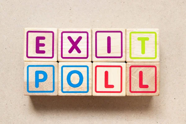 Color Letter Block Word Exit Poll Wood Background — Stockfoto