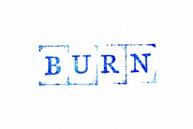 Blue color ink rubber stamp in word burn on white paper background