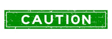 Grunge yeşil dikkat word Meydanı lastik mühür damgası beyaz arka plan üzerinde