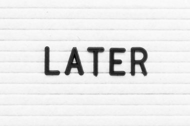 Black color letter in word later on white felt board background