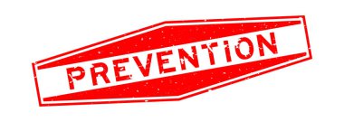 Grunge kırmızı önleme sözcüğü altıgen lastik mühür beyaz arka planda