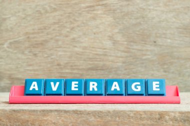 Tile alphabet letter with word average in red color rack on wood background