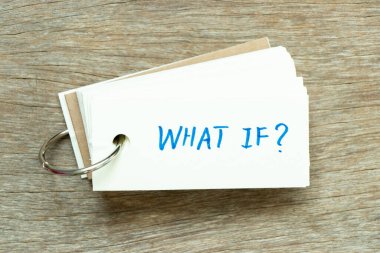 Flash card with handwriting word what if on wood background